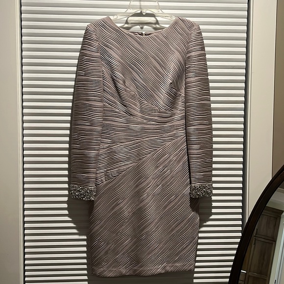 Stunning silver cocktail dress with beaded cuffs. - Picture 1 of 1